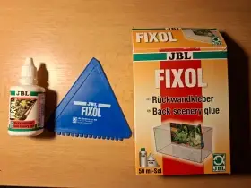 Lepidlo na akvarijní pozadí